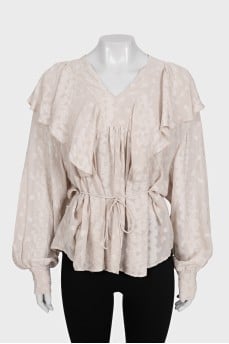 Loose-fitting ruffle blouse with tag