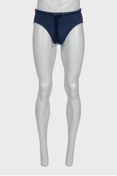 Men's blue swimming trunks with tag