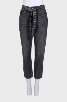 Cropped jeans with a rhinestone-embellished belt