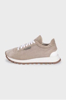 Suede sneakers with branded decor