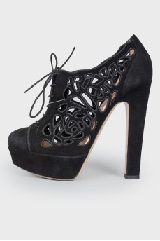 Black suede high-heeled ankle boots