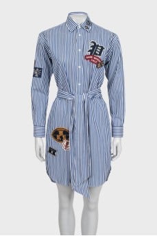 Striped shirt dress decorated with patches