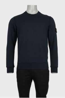 Men's blue sweatshirt with branded patch and tag