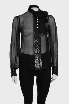 Transparent blouse decorated with sequins