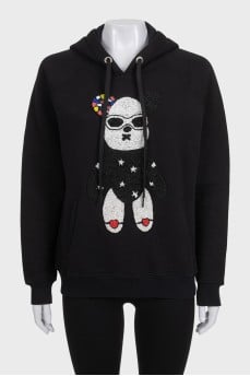 Black hoodie with a hood and voluminous decor