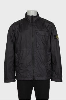 Men's black windbreaker with branded patch