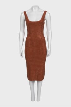 A brown bodycon dress decorated with rhinestones