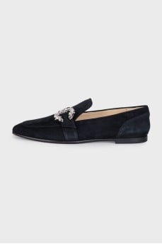 Black suede loafers with embellished strap