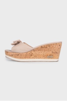 Beige leather mules with a wooden platform