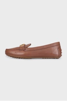 Brown leather loafers with gold logo