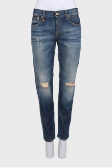 Рваные джинсы зауженного кроя с потертостями 