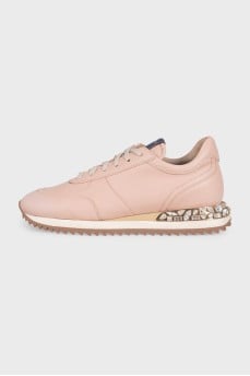 Pink leather sneakers decorated with crystals