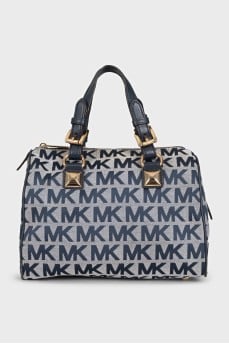 A textile bag with a signature print and handles