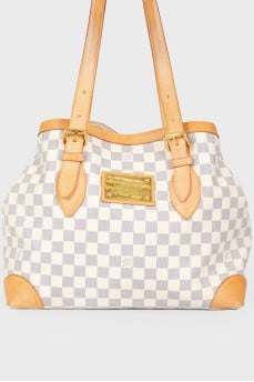 Leather brown bag with brand's branded print