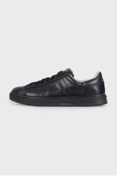 Men's black sneakers decorated with stripes