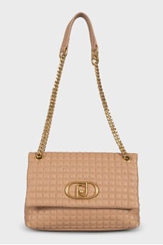 Brown quilted leather bag with tag