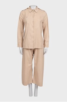 Striped suit with wide trousers and a shirt
