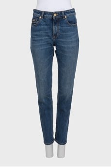 Straight-leg blue jeans with a distressed effect