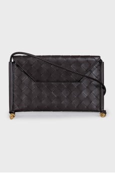 Woven leather bag with a thin strap