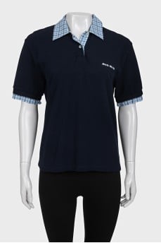 Blue polo shirt with a checkered print collar