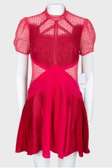 Crimson lace dress with a tag