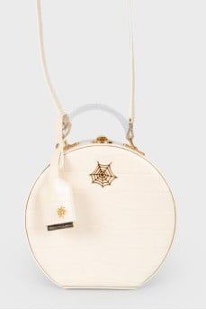 Round bag made of snake leather