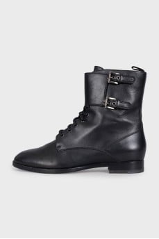 Black leather lace-up boots with straps