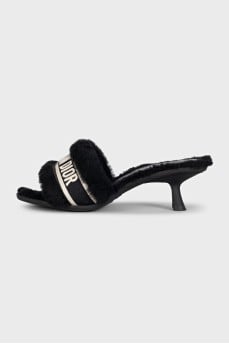 Mules with heels decorated with fur