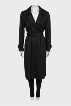 Fitted black coat with a belt