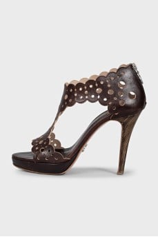 Brown leather sandals with perforations
