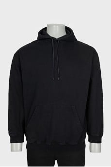 Men's black loose-fitting hoodie with brand logo