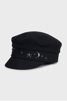 Black wool cap with decoration