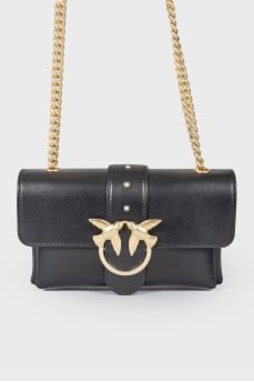 Leather bag with golden fittings