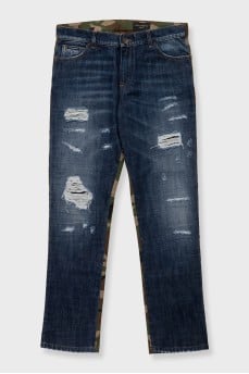 Men's blue ripped jeans with a military print