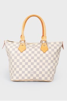 Bag in a cage