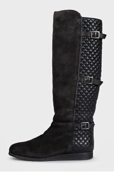 Quilted leather boots decorated with straps
