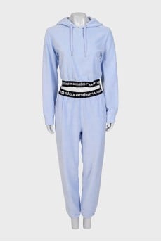 Blue tracksuit with black elastic waistbands with logo