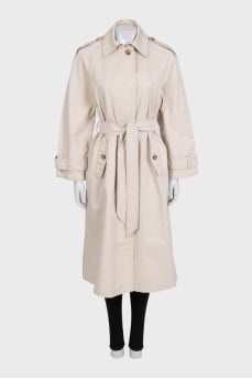 Beige trench coat with a buttoned belt