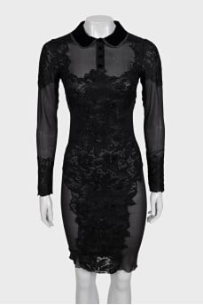 A transparent black dress decorated with lace