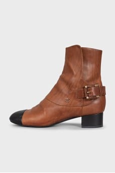 Brown leather ankle boots with black toe
