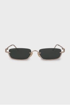 Narrow sunglasses with green tint