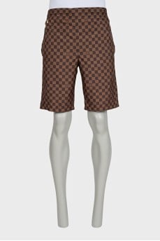 Men's brown shorts with a signature print