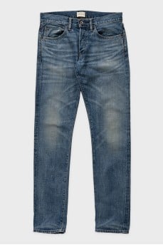 Men's blue skinny jeans with a distressed effect