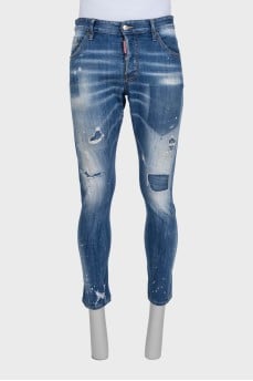 Men's blue jeans with a distressed effect