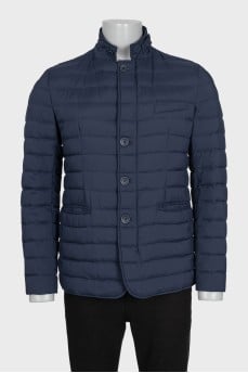 Dark blue men's quilted jacket with pockets