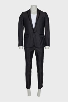 Men's suit consisting of a jacket and trousers with stripes