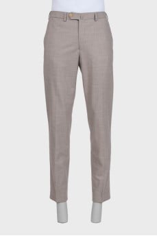 Men's gray trousers with creases, zippers and buttons