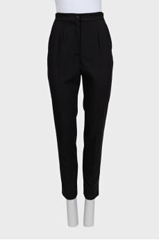 Black wool trousers with tag