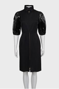 Black dress with puff sleeves and a zipper