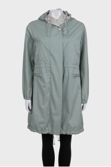 Light green cloak with a hood and pockets